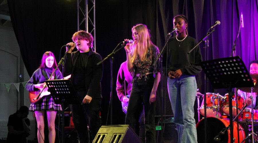 Young people performing at Beautiful Noise - community Music Day